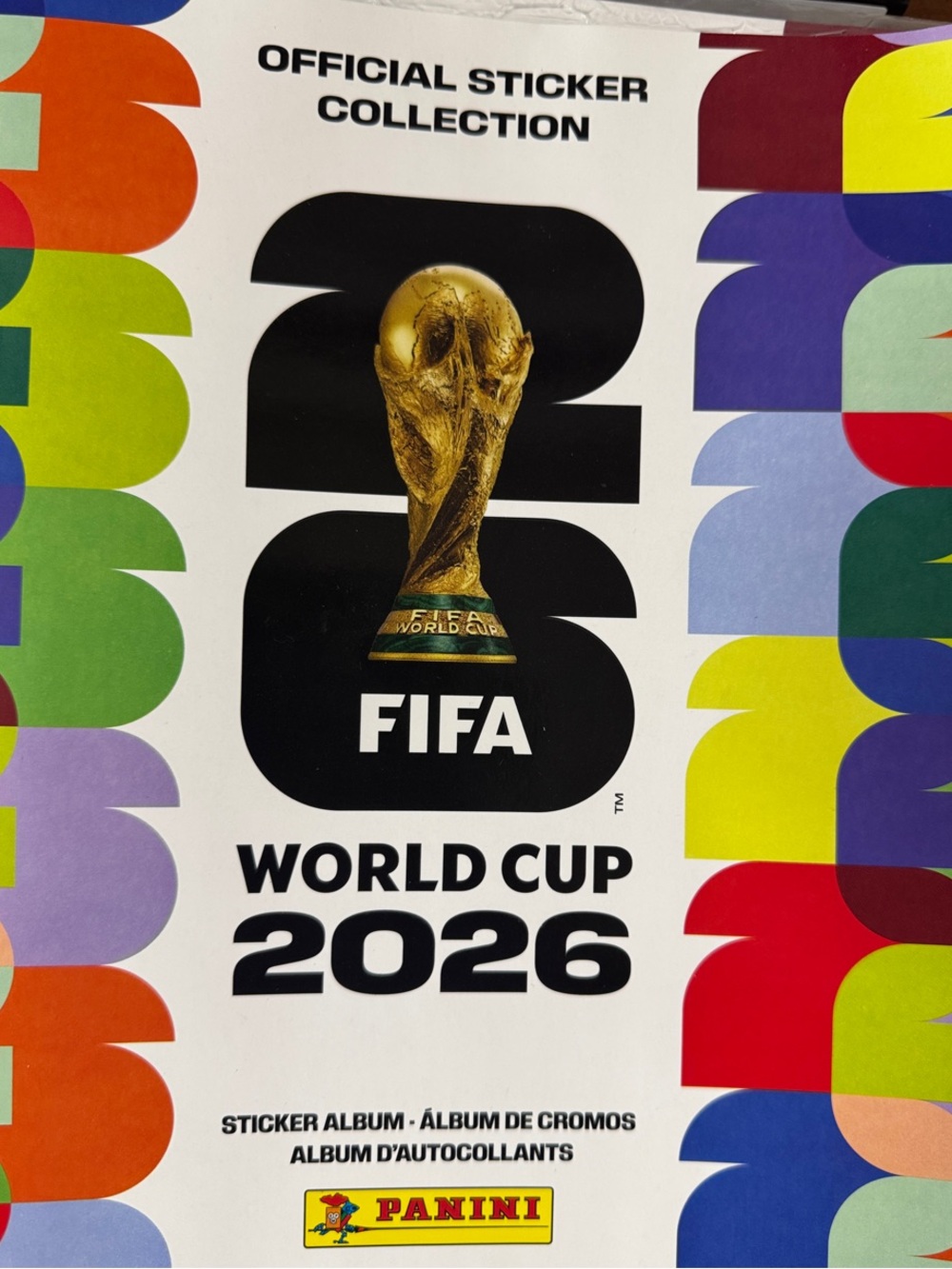 Panini White Cover with Bold Black 'WE ARE 26' and Multicolor Side Panels